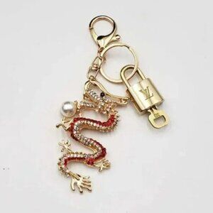Louis Vuitton Gold Lock 🔒 Authentic LV Key + Unbranded Dragon Bag Charm